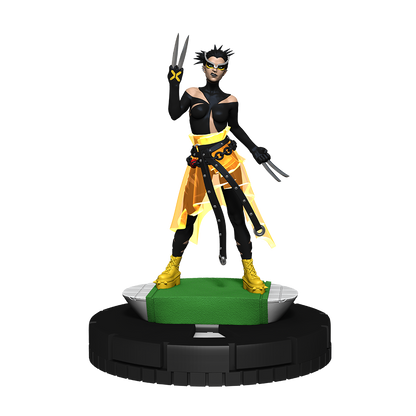 A Marvel HeroClix X-Men Hellfire Gala Premium Collection 2 figure depicts a female character in black and yellow with blades, standing on a green and black base