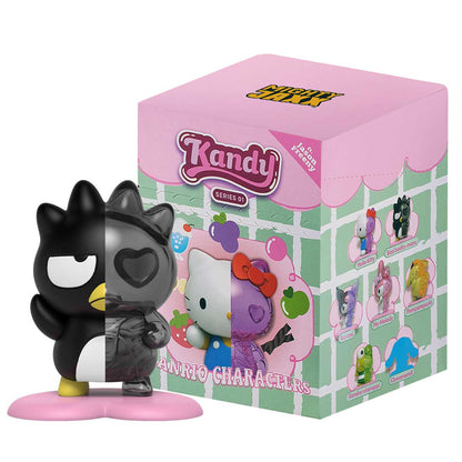 Bad Badtz-Maru collectible figure, split into solid and clear halves, next to the Kandy Series 01 Sanrio toy box
