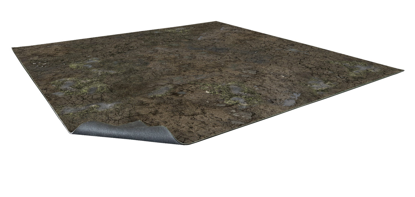 A rectangular mat with a cracked earth, mud, and moss design. One corner is rolled up, revealing the grey underside.