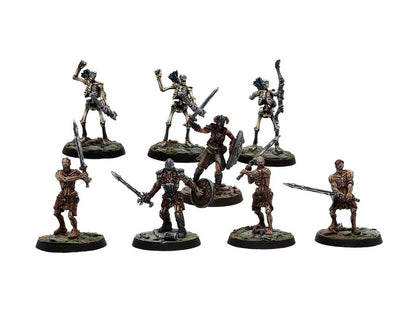 Eight painted Skyrim tabletop miniatures: four skeletons, three draugr, and a horned warrior, all armed for battle