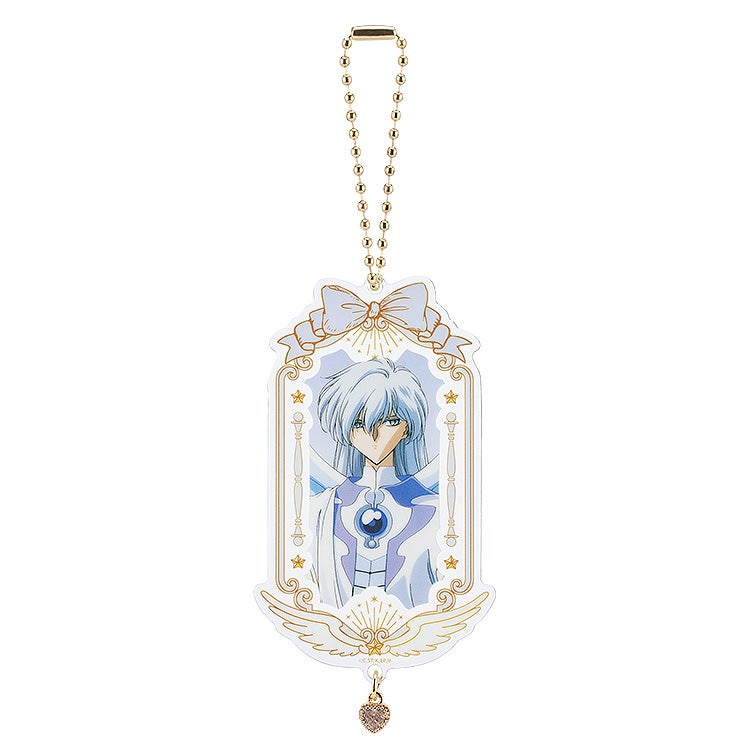 Cardcaptor Sakura 25th Anniversary Kero-chan acrylic keychain in a decorative gold frame with blue ribbon and white wings and a small heart charm