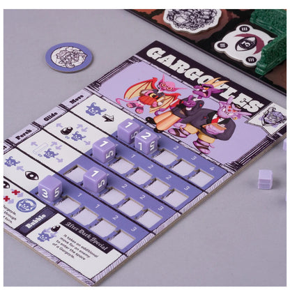Close-up of a "Gargoyles" board game player board showing cartoon artwork and purple cubes marking abilities