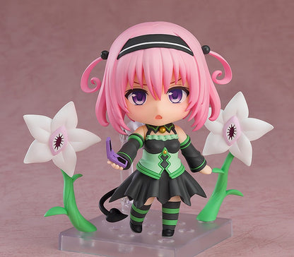To Love Ru Darkness Nendoroid Momo Belia Deviluke figure holding a purple phone standing between two large white alien flowers