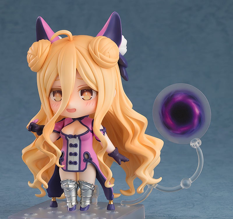 Nendoroid Hoshimiya Mukuro figure in pink dress and metal greaves with dimensional vortex