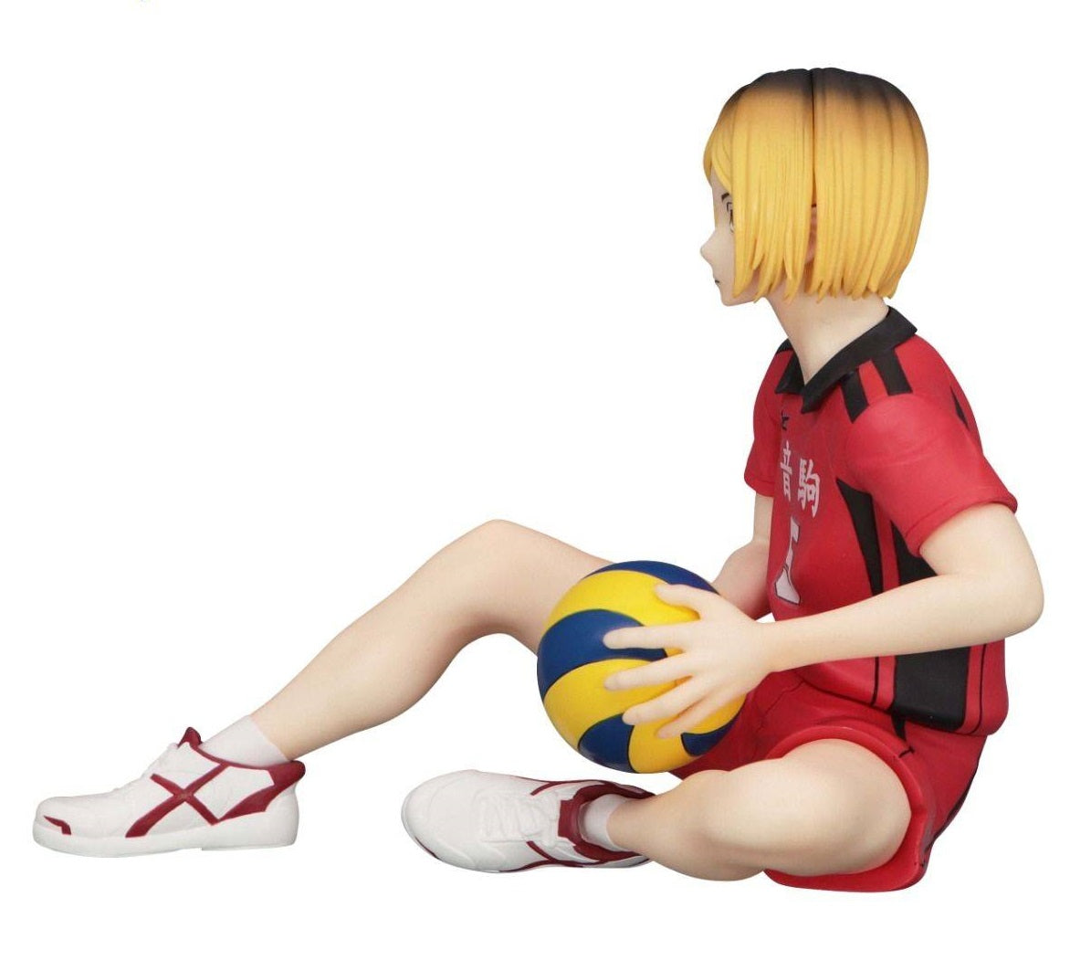 Kenma Kozume noodle stopper figure in hoodie, seated with arms on knees, neutral face