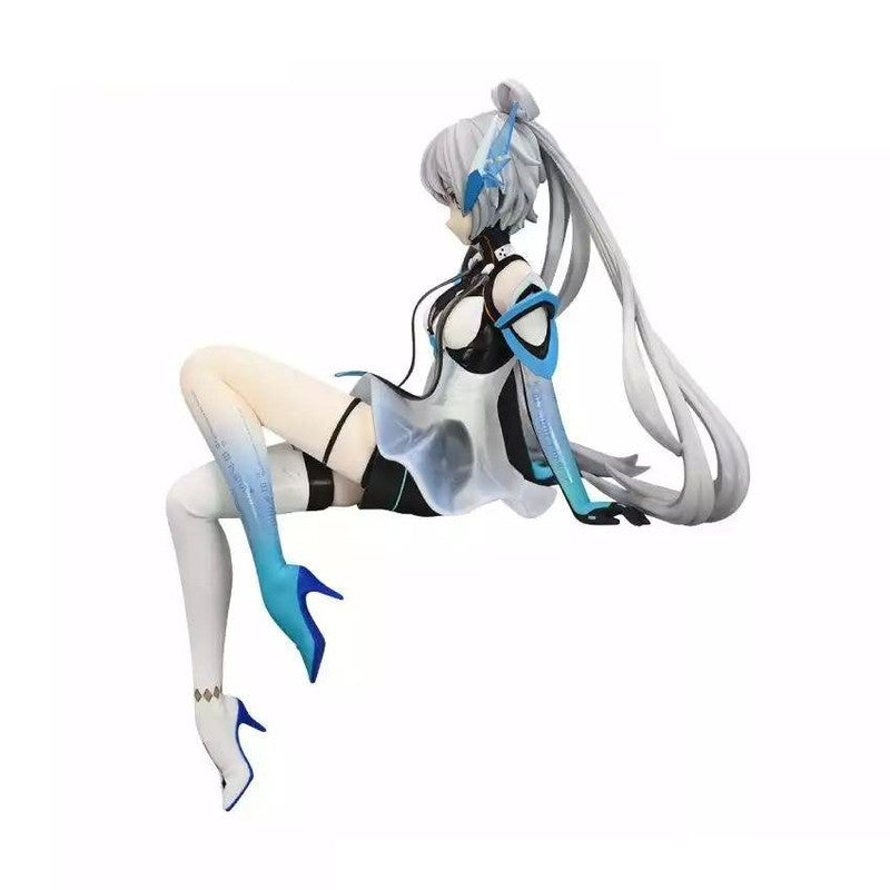 Hatsune Miku from Vocaloid in a futuristic black white and blue outfit sitting with legs extended
