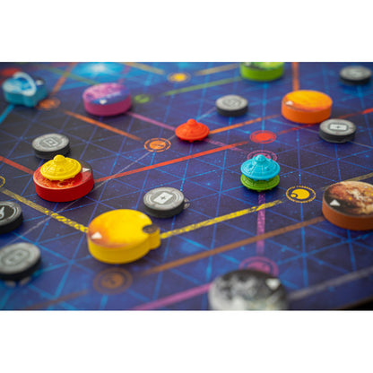 Colourful UFO tokens and round markers on a futuristic board game map with intersecting blue and orange lines