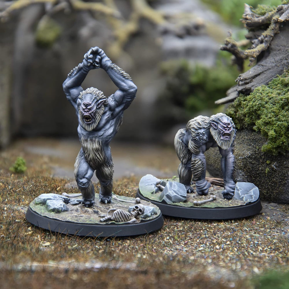 Two detailed grey cyclops-ape miniatures. One stands, fists raised; the other crouches, snarling.