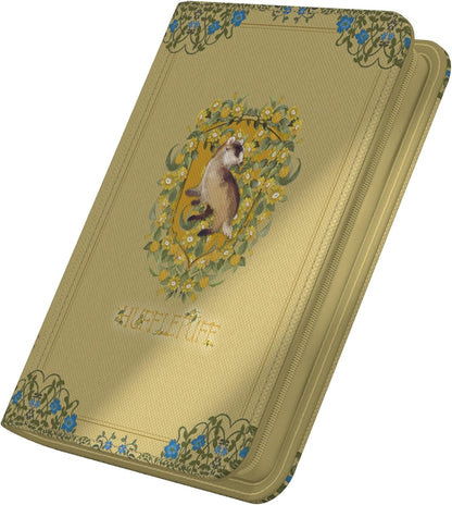 The light tan XenoSkin Zipfolio 160 displays the Harry Potter Hufflepuff badger logo centered among yellow flowers and blue Art Nouveau border details