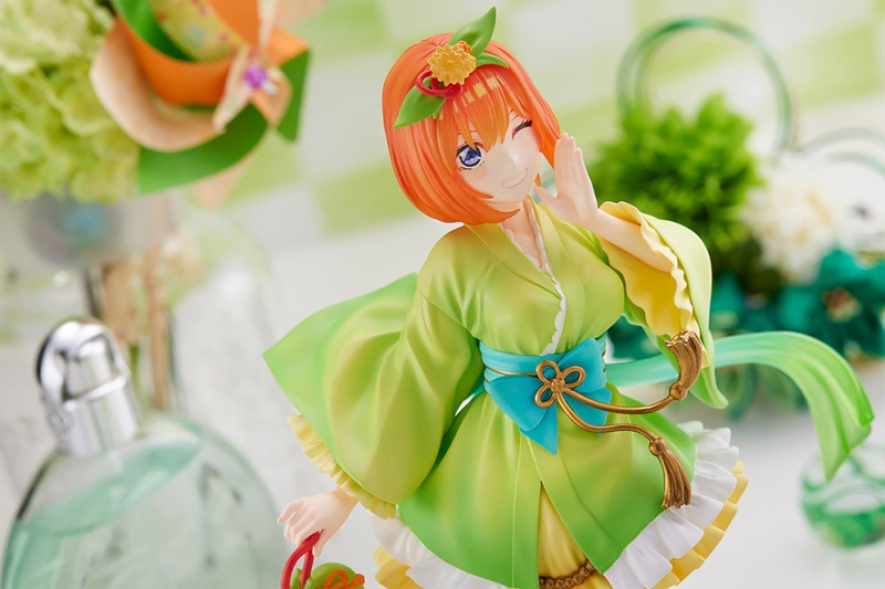 Yotsuba Nakano anime figure in green and yellow kimono winking and waving