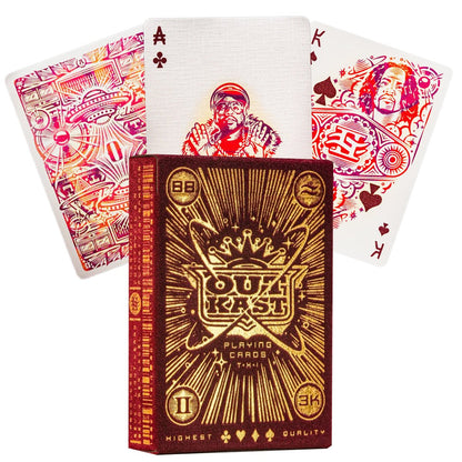 OutKast playing card deck box (red/gold) displayed with custom cards featuring portraits of Big Boi and Andre 3000