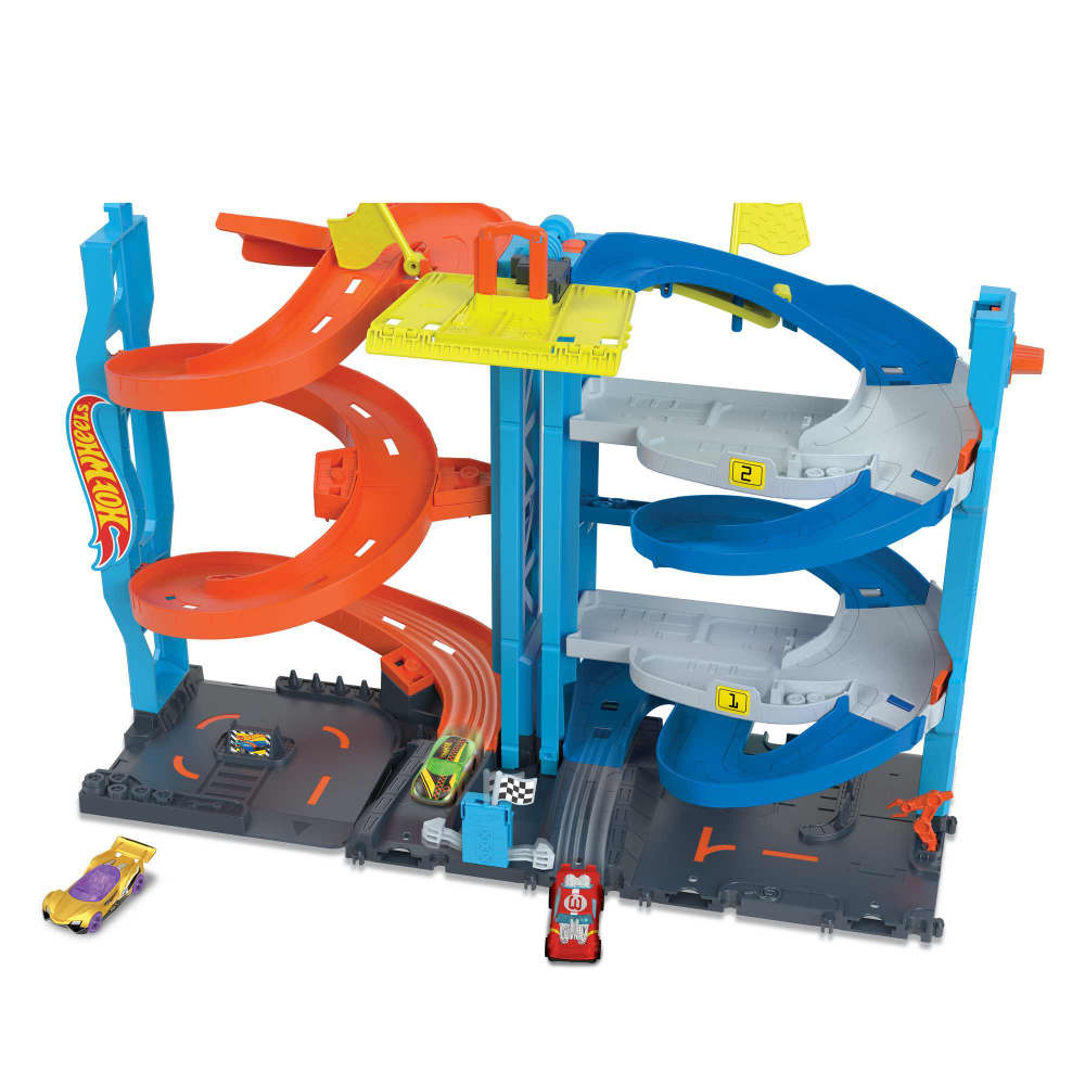 Hot Wheels Transforming Race Tower playset with orange spiral ramp, blue tracks, and toy cars