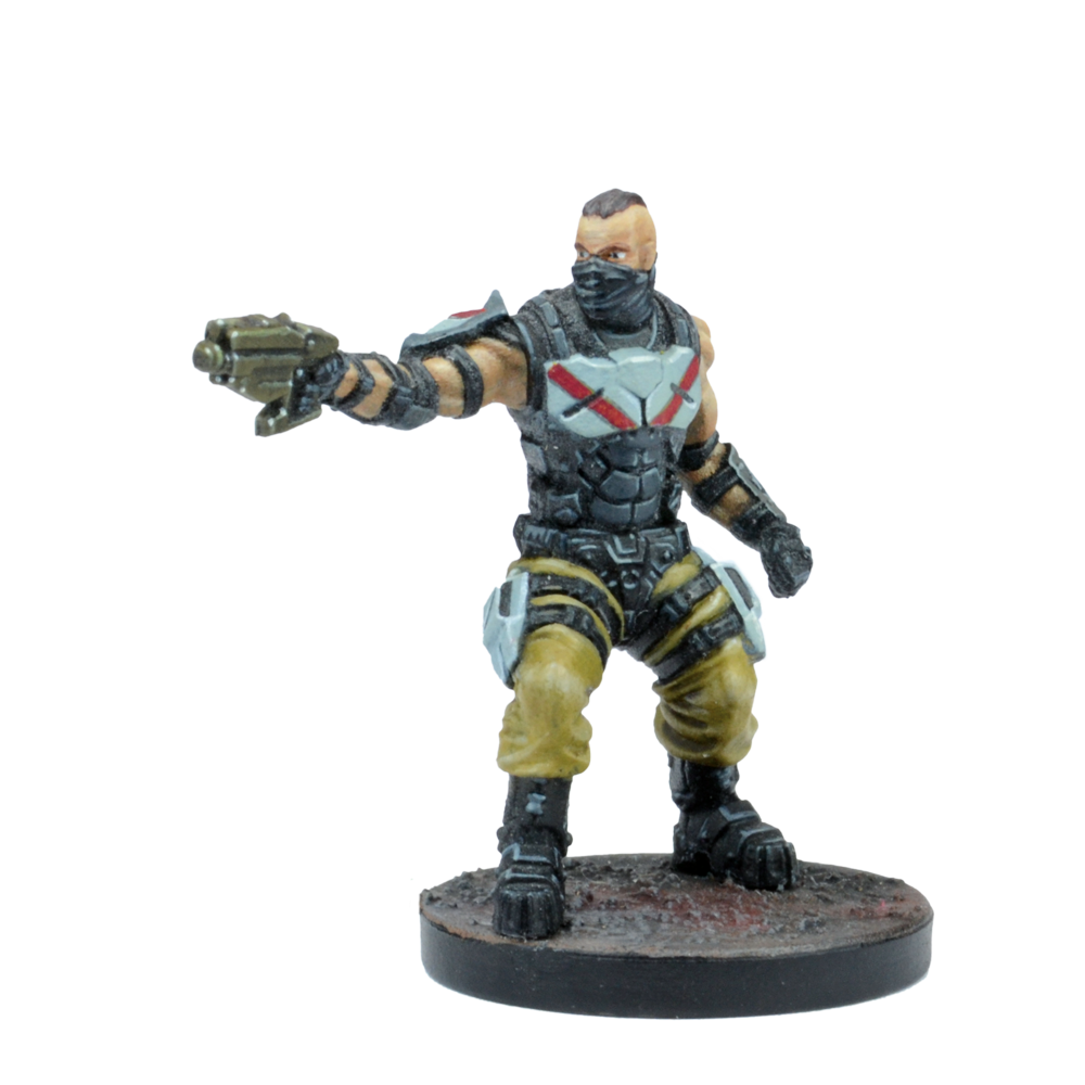 A painted miniature of a masked character in tactical gear with a mohawk, aiming a sci-fi blaster