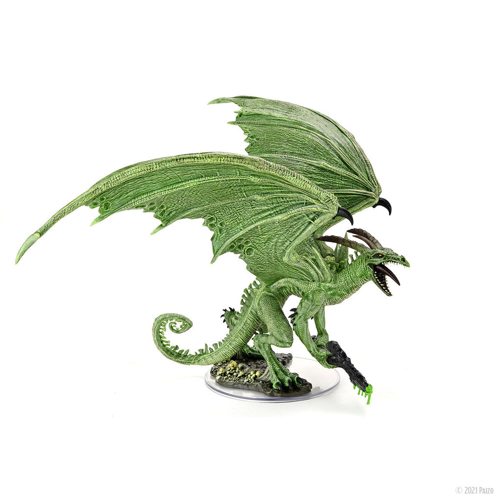 A green dragon miniature with spread wings roaring, acid dripping from its claw, standing on a clear base