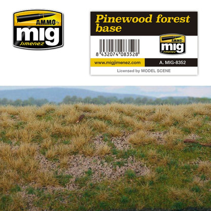 AMMO by Mig Jimenez 'Pinewood forest base' label above a model landscape with dry grass and soil patches.
