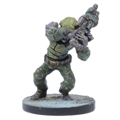 Miniature of a monstrous figure in green camouflage and armor, aiming a large sci-fi rifle