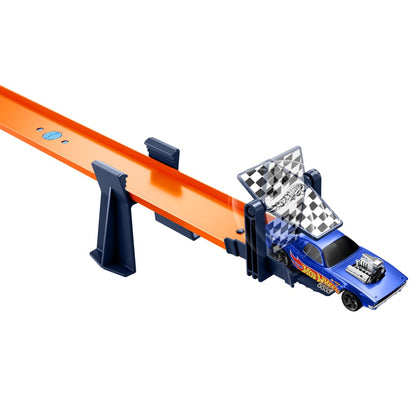 Blue Hot Wheels car on an orange track, passing through a checkered finish line gate