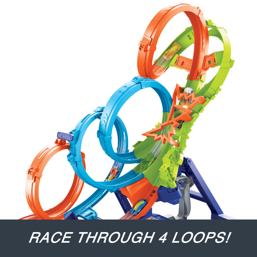Colorful Hot Wheels track with four loops. Miniature cars race through orange, blue, and green sections