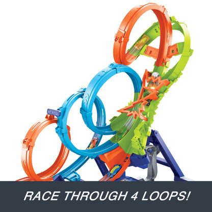 Colorful Hot Wheels track with four loops. Miniature cars race through orange, blue, and green sections