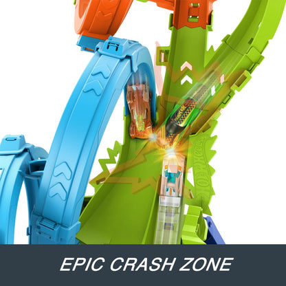 Two Hot Wheels cars collide on blue and green tracks, creating a bright flash in an "Epic Crash Zone"