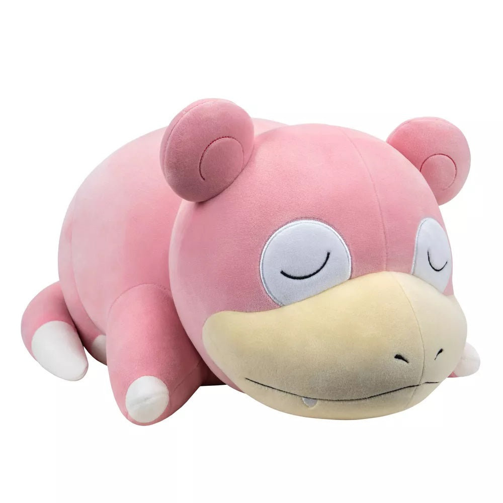 Pink Slowpoke Pokemon plush toy lying down and sleeping