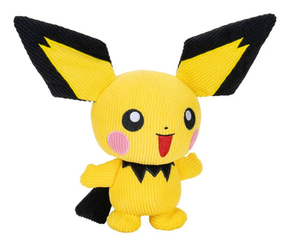 Yellow corduroy Pichu Pokemon plush toy with black ears, pink cheeks and a smiling face