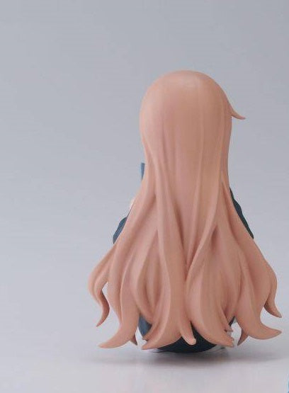 Front angle of Hanako figure showing folded arms and facial details