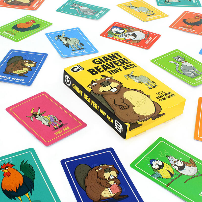 Giant Beaver! Tiny Ass! game box and components spreaded cards