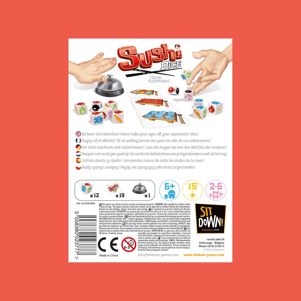 Sushi Dice box and components arranged for display with sushi-themed visuals