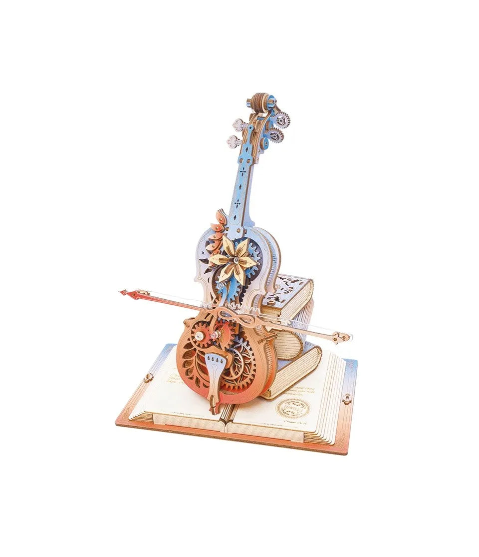 Intricate wooden model of a stylized violin featuring visible gears and a bow, placed on stacked books