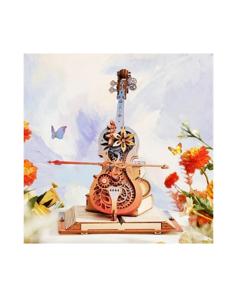 Detailed wooden kinetic violin model with exposed gears, sitting on an open book, amidst flowers and butterflies
