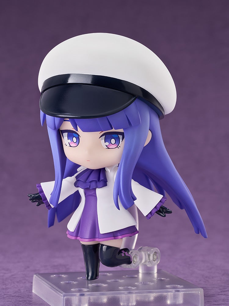 Nendoroid character figure in purple and white outfit with white cap and boots
