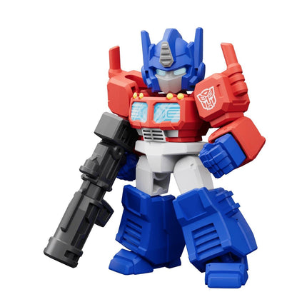 Red and blue Optimus Prime stylized figure holding a large black rifle