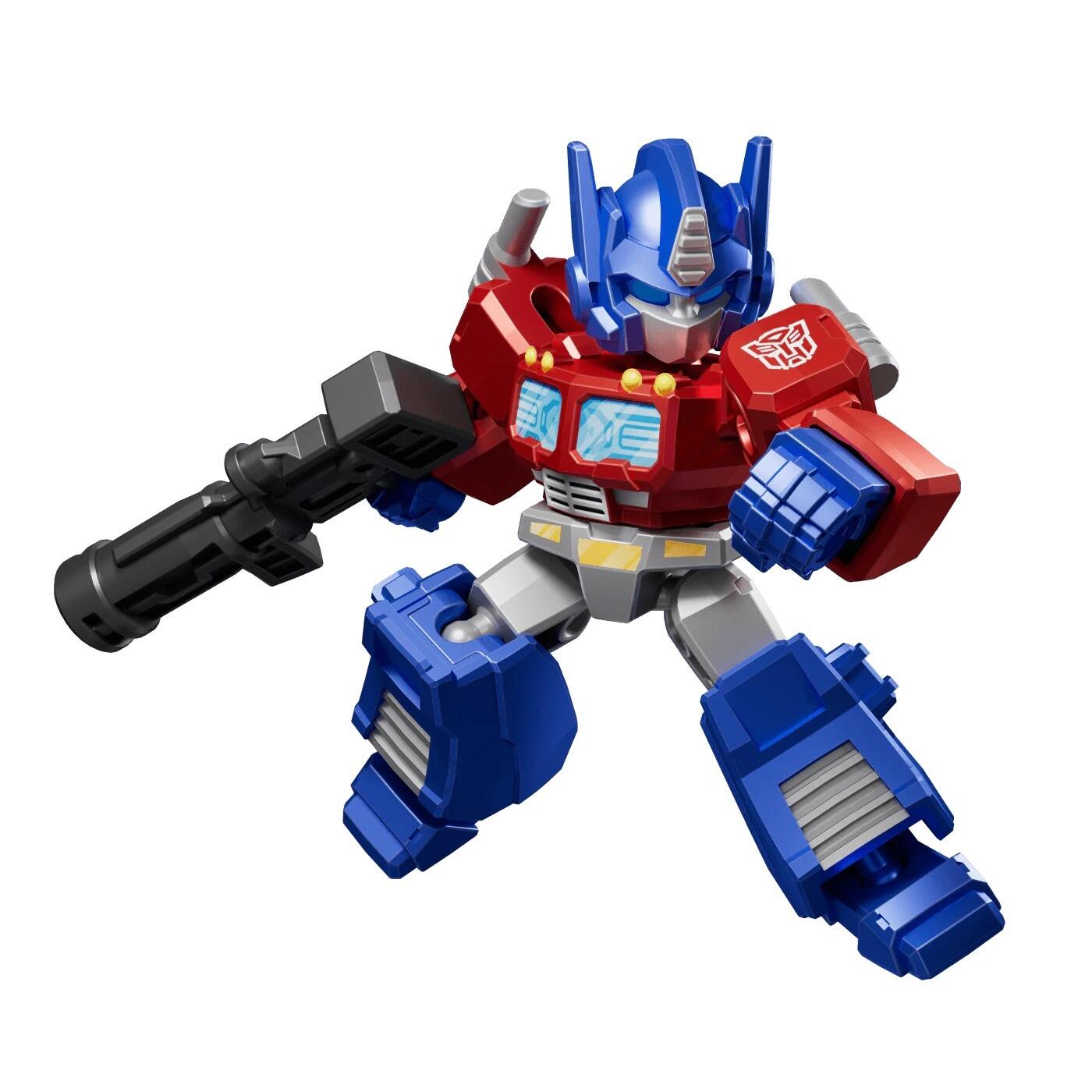 Blocky Optimus Prime figure in red and blue, posed dynamically while holding a black rifle