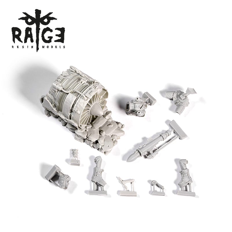Unpainted grey resin model kit parts, including a damaged jet engine, weapons, and mechanical components