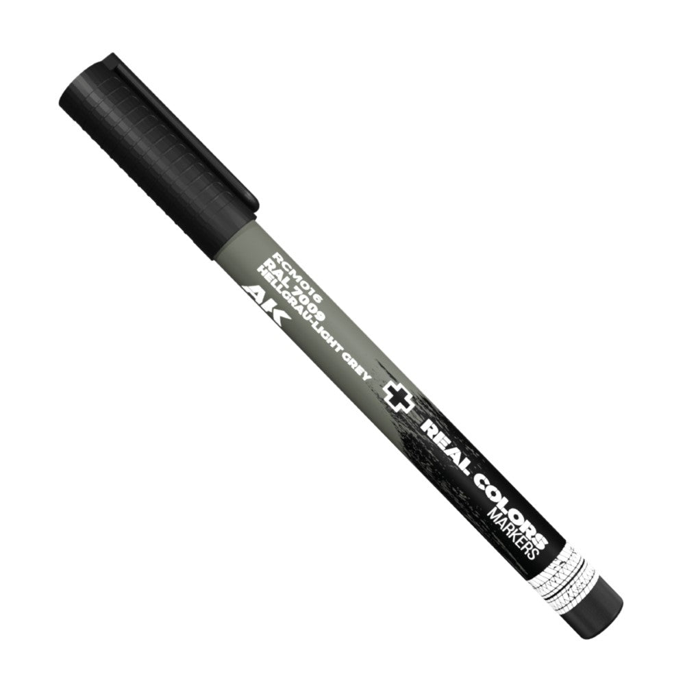 A grey AK Real Colors marker, labeled "HELLGRAU-LIGHT GREY" (RAL 7009), with a black cap