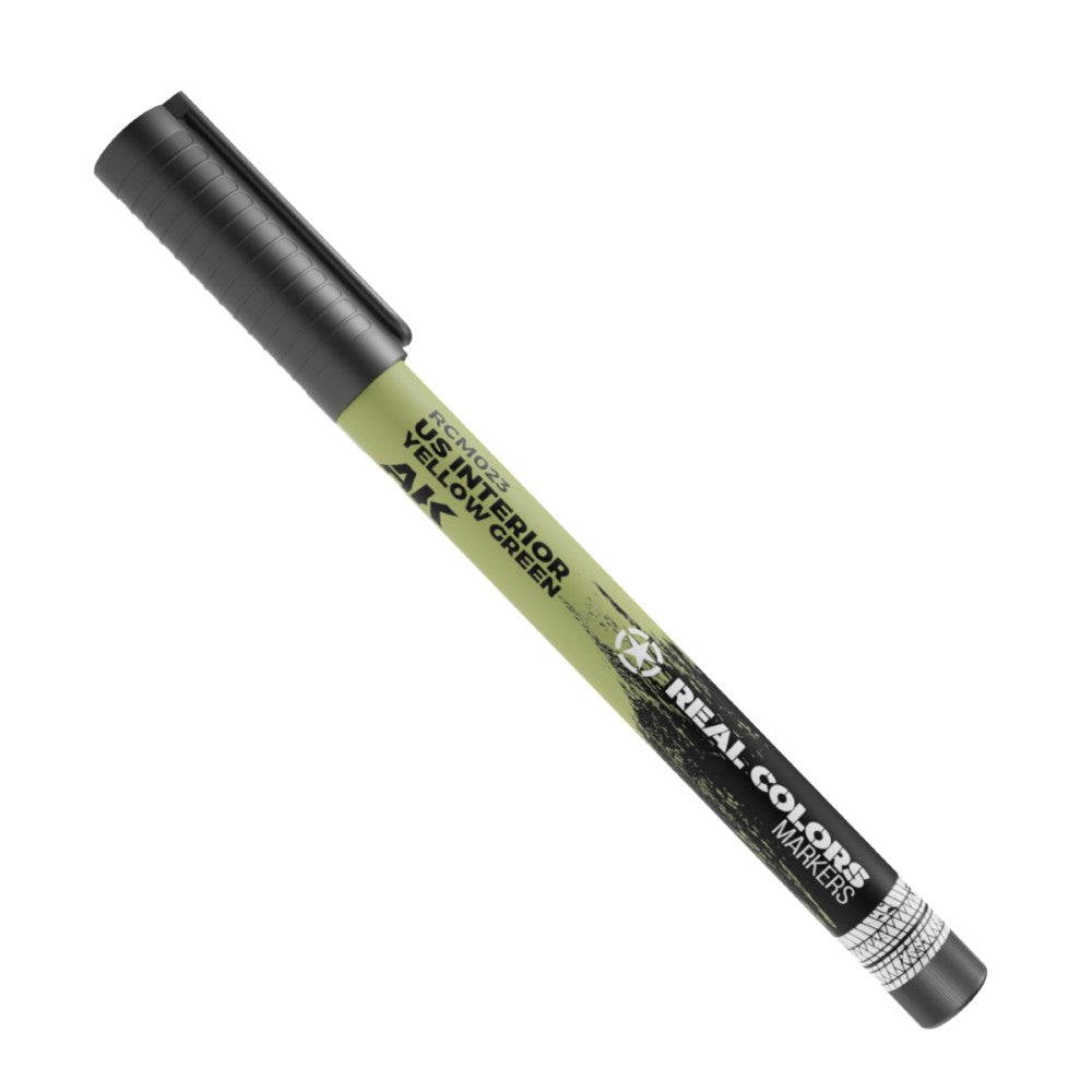 A green AK Real Colors marker, labeled "US Interior Yellow Green," with a black cap, on a white background