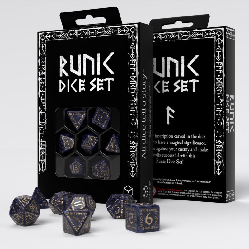 A Runik Dice Set with dark blue and gold runic polyhedral dice, some in a black display box, others scattered below