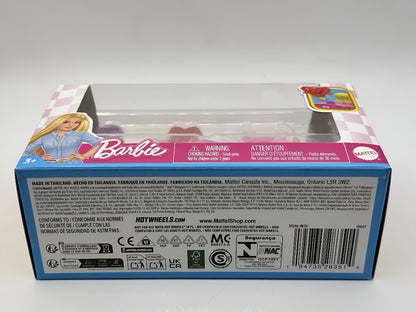 Boxed Hot Wheels RacerVerse Barbie Die-Cast Vehicles playset featuring a blonde Barbie doll in a blue shirt, with various small accessories visible inside