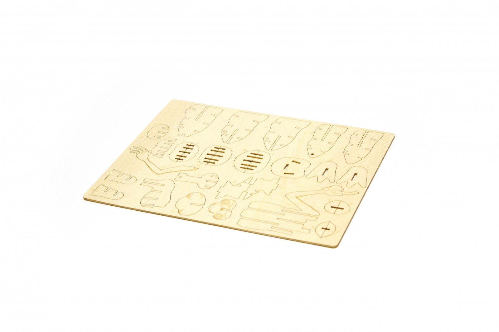 Light brown wooden sheet with laser-cut pieces for an ET the Extra-Terrestrial 3D wood model kit