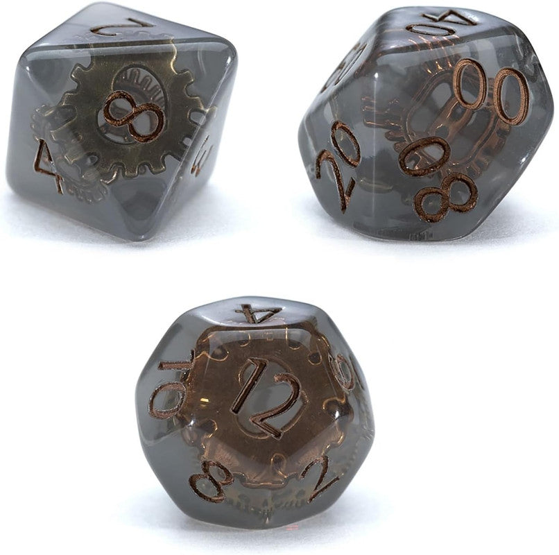 Set of three smoky gray steampunk dice with bronze cogwheel inclusions and engraved numbers
