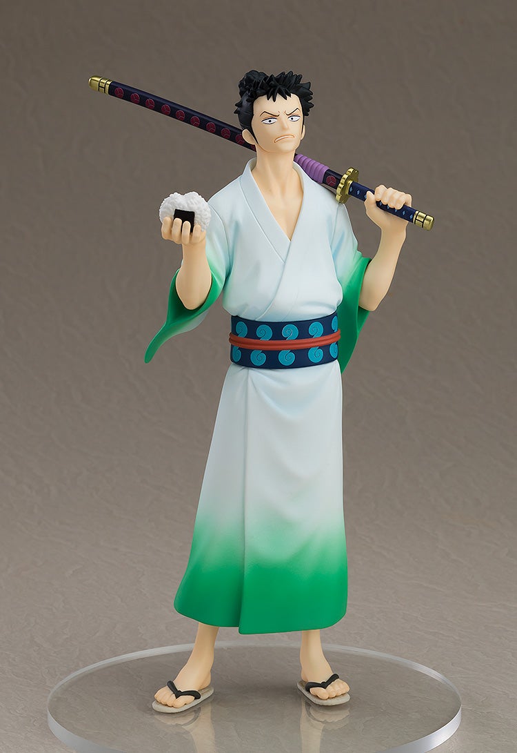 Anime figure in a white-to-green yukata, holding a katana over his shoulder and an onigiri in his hand