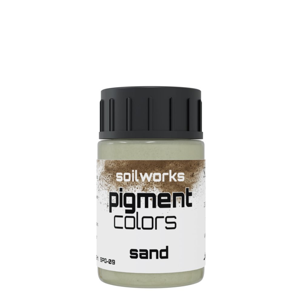 A small clear bottle of Scale 75 Soilworks Pigment colours in a sandy hue, featuring a black ribbed cap and white label with dusty pigment texture