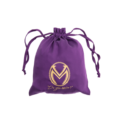 A purple fabric drawstring bag, cinched at the top, with a gold 'VM' logo and 'Do you spice?' text