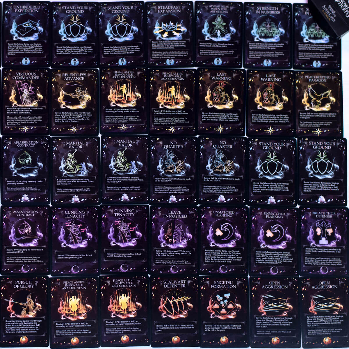 A grid of numerous dark-themed game cards with white titles, diverse illustrations, and text, laid out on a white surface.