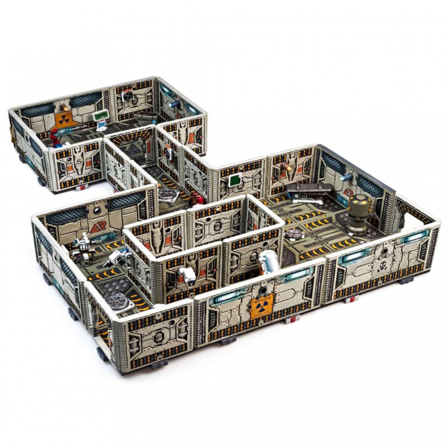 Miniature modular sci-fi terrain set depicting interconnected metal rooms and corridors