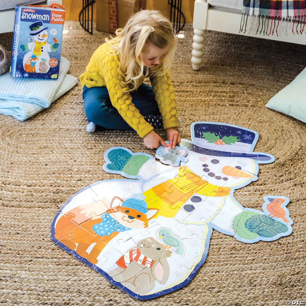 Fully assembled snowman floor puzzle on floor