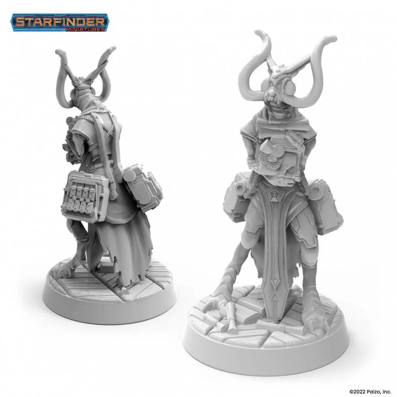 Two unpainted Starfinder Shireen Scholar miniatures of a horned alien. The grey, bipedal creature is heavily equipped with gear, shown in front and back views