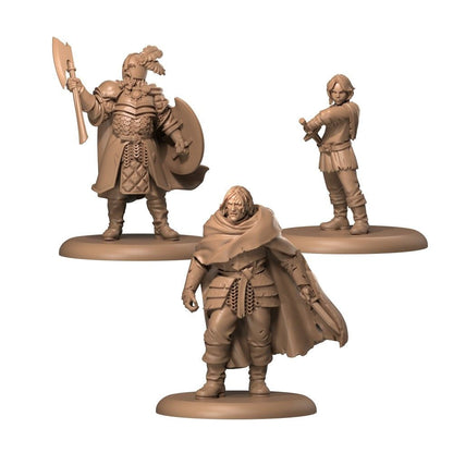Three unpainted tan fantasy miniatures: an armored warrior with axe & shield, a cloaked figure with a dagger, and a young swordsman