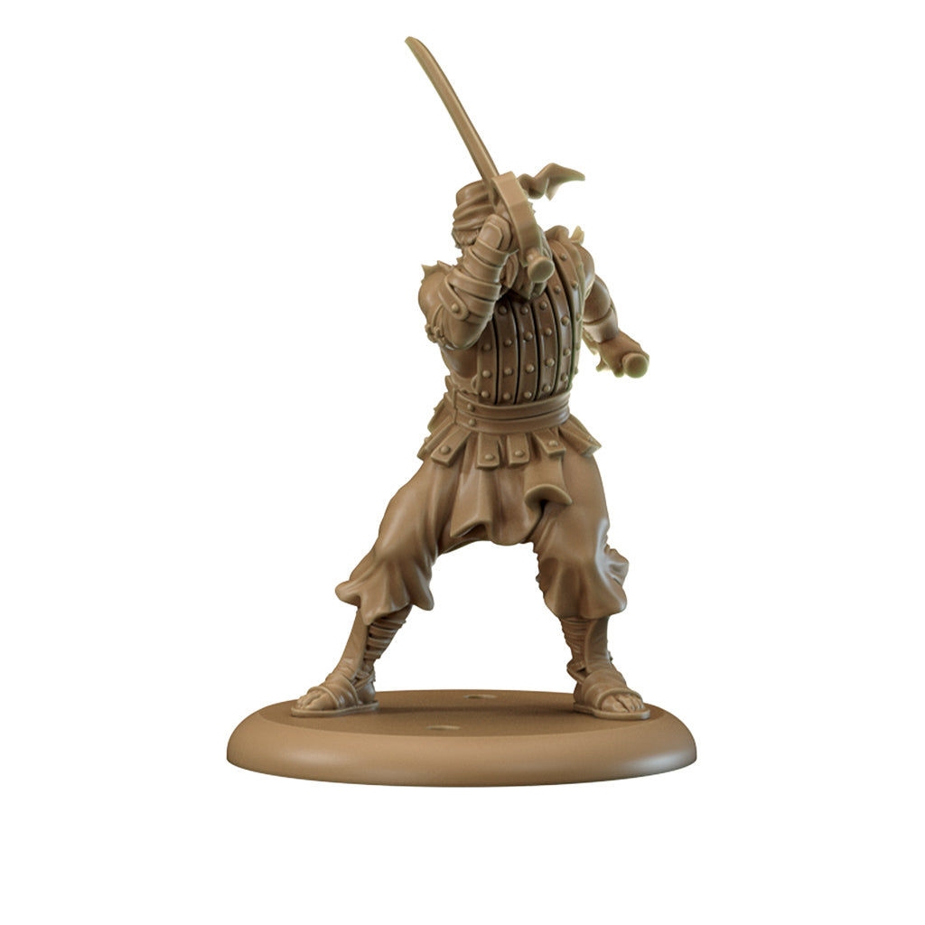 An unpainted beige miniature of an armored warrior with sword poised to strike